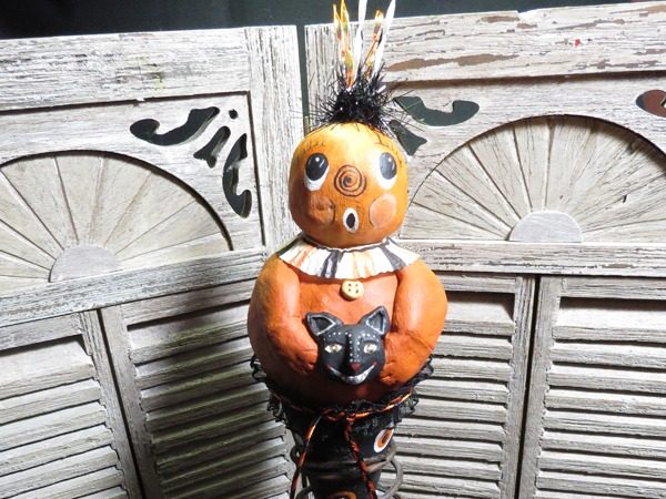 Paper Mache Cone with Jack holding a cat head mask